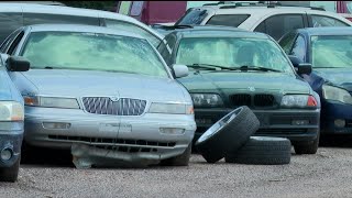 Abandoned cars filling impound lot