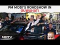 Pm modi in assam  pm modi holds massive roadshow in guwahati