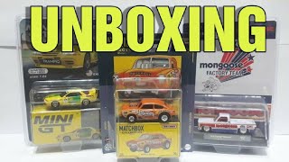 Unboxing a few cars from Christmas. M2 Machines, Matchbox, & Mini GT