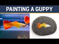 Painting A Guppy On A River stone