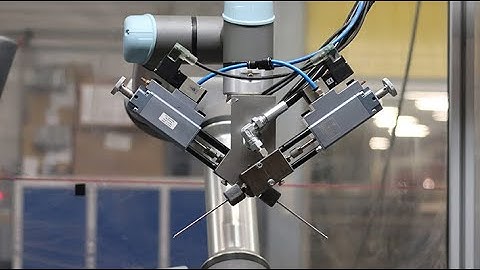 Grease application system for automotive industry