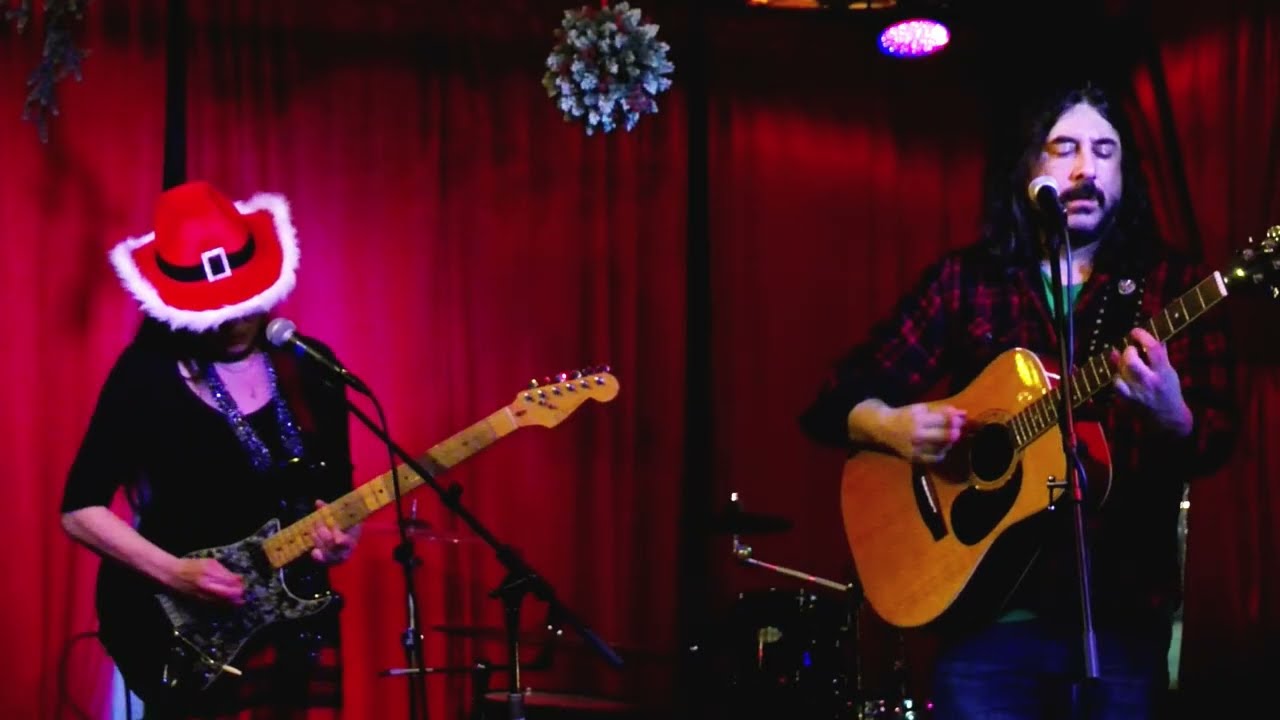 Mitchell performs a cover of The Red Hot Chili Peppers "Californication"