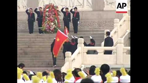 8-yr-olds mark coming of age by receiving red scarves from Communist party - DayDayNews