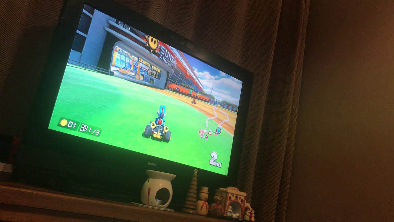 I’m come pleating 100cc in mario kart with the steering wheel and