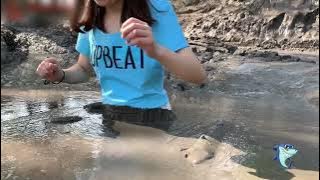 White dress girl in mud with her blue T-shirt