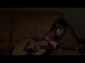 3 year old playing guitar and singing