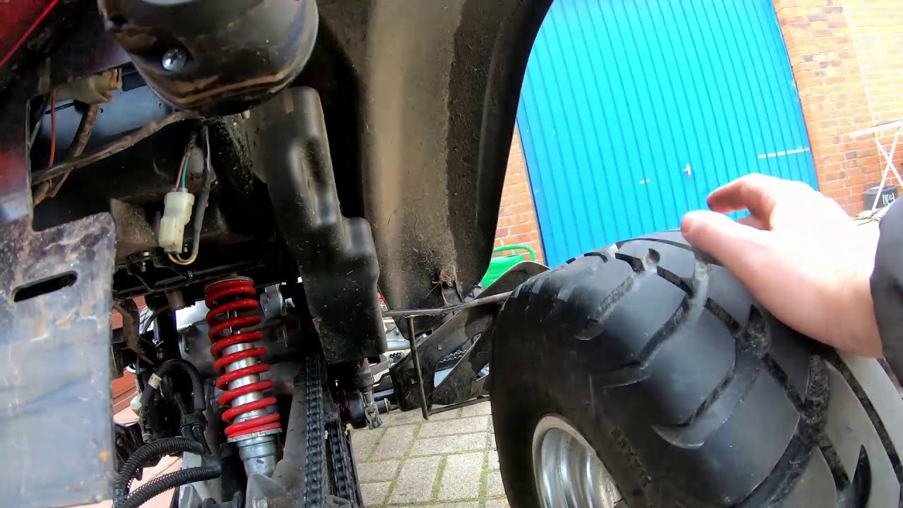 Quad Kette Spannen