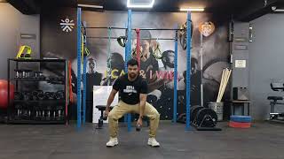 DUMBBELL DROP SQUAT TOUCH DOWN