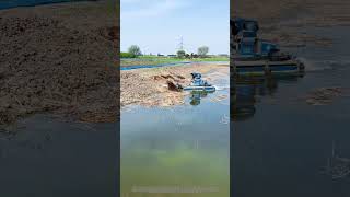 Efficient operation: amphibious boat cleaning weeds on water and land
