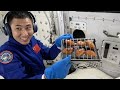 Taikonauts cook in China Space Station