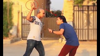 دافع عن نفسك من رمي الطوب والحجارة والزلط عليك | الطريقة فعالة 100% Defense against  throwing stones