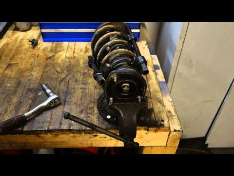 How to replace rear shock Toyota Corolla. Years 1991 to 2010