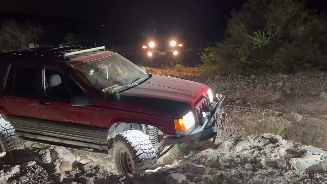 Zj on rough country long arms and 35s crawling up a 4ft ledge YouTube