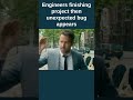 Engineers finishing project then unexpected bug appears