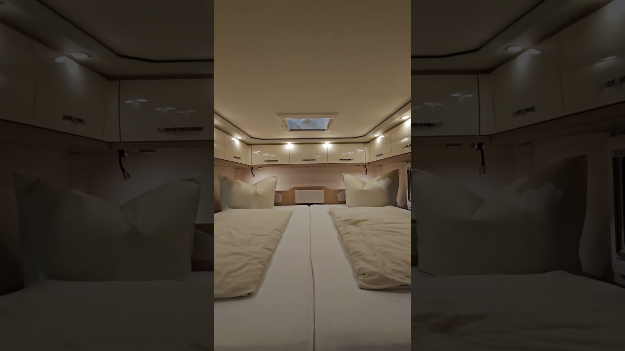 A luxurious motorhome with a garage for a car!