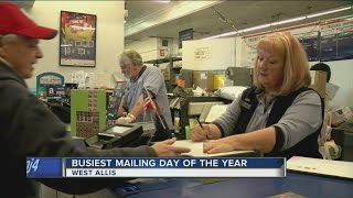 Long lines form on busiest mailing day of year