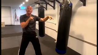Tactical entry and exit on a heavy bag
