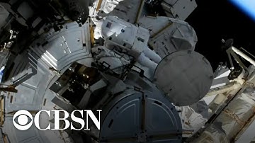 Astronauts install new solar panel on the International Space Station