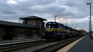 DM&E 6070 leads CP 472 at Wood Dale, IL