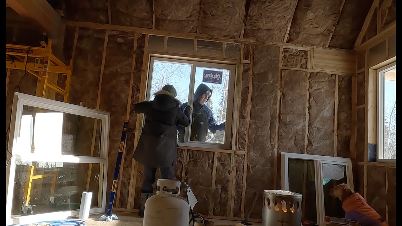 First Floor Windows Installed in our Off Grid Cabin in Alaska, and Ice Fishing for Lake Trout!