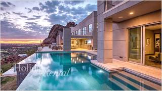 Luxury mansion vacation rental with 8 bedrooms, 10 bath and incredible
views of the city lights! on top camelback mountain includes an
infinity pool a...