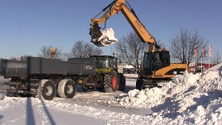 CAT M316D loading snow on CLAAS 650 Arion and John Deere 5100R by swedengines 11,269 views 4 years ago 6 minutes, 46 seconds