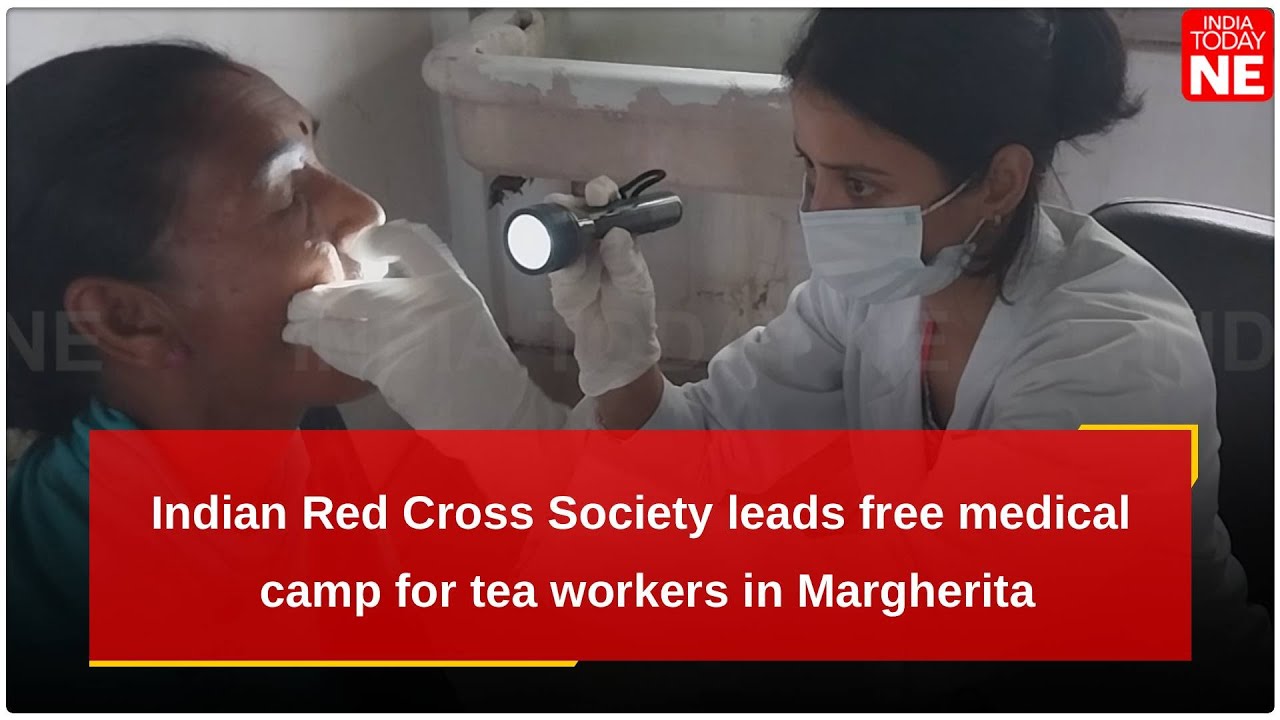 Индийское общество Красного Креста проводит бесплатный медицинский лагерь для работников чайной п...