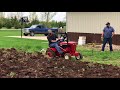 Plowing with a wheel horse raider 12