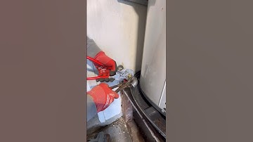 installing a gas sediment trap before a hot water heater