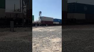 6/17/2026: BNSF H2 7733 with BNSF Warbonnets 712, 729 led Northbound Stack Train in West Colton, CA