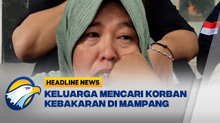 Keluarga Mencari Korban Kebakaran di Mampang