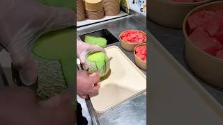 Peeling honeydew melon: A juicy, sweet fruit rich in vitamin C, great for fresh eating or in salads