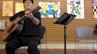 John Gage leads sing-a-long