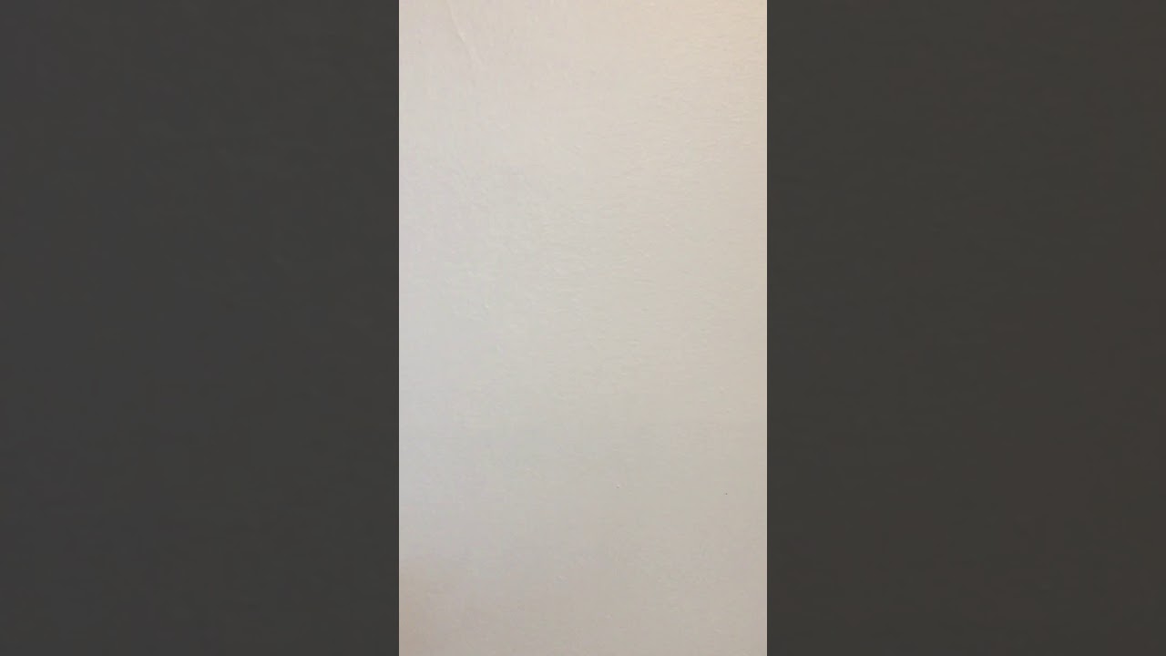 Covering up nail holes on a white wall 