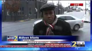 Snow falls in midtown Atlanta