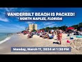A beautiful monday afternoon and vanderbilt beach is packed  north naples florida 031124