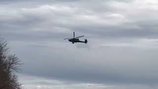 North Carolina National Guard Boeing AH-64 Apache helicopter flying over the Cape Fear River