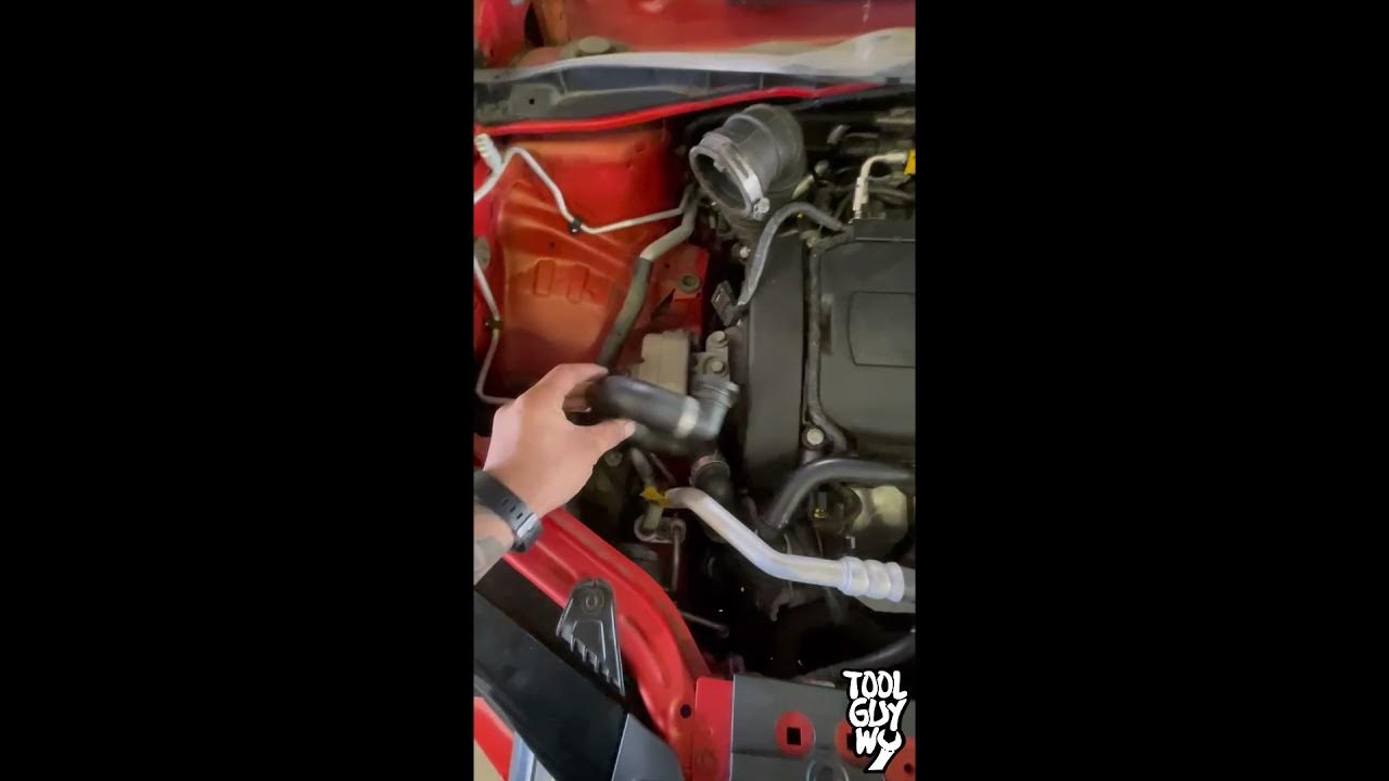 Chevy sonic AC low pressure port location - YouTube