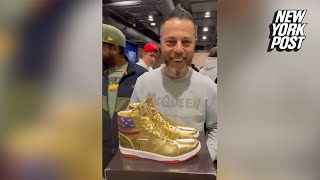 Russian CEO wins autographed golden Donald Trump sneakers after $9K bid