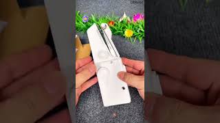 Portable Handheld Sewing Machine – Mini Quick Stitch Tool SKU: 21730 | Rs. 599.00#oblivion