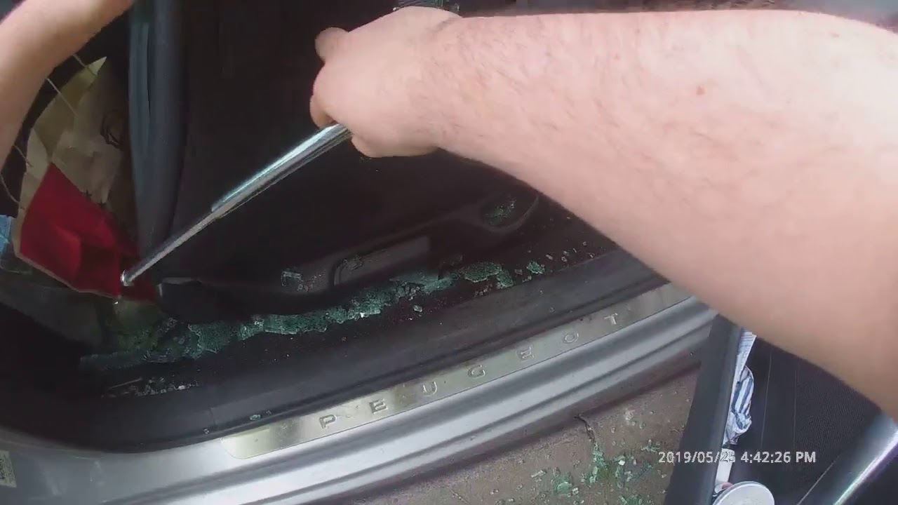 Police Officer Smashes Window to Save Dog Locked in Hot Car - YouTube