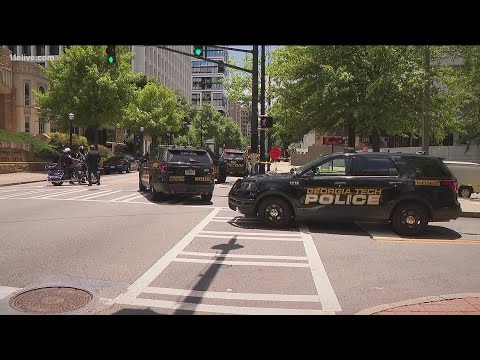 Officer shot during ambush in Midtown Atlanta, suspect killed - YouTube