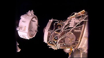 Dextre Extracts Docking Adapter From SpaceX Dragon | Video