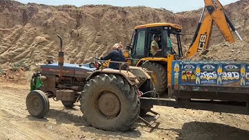 Jcb 3dx Backhoe Loader Loading mud in Powertrac Tractor || jcb and tractor video Part-01