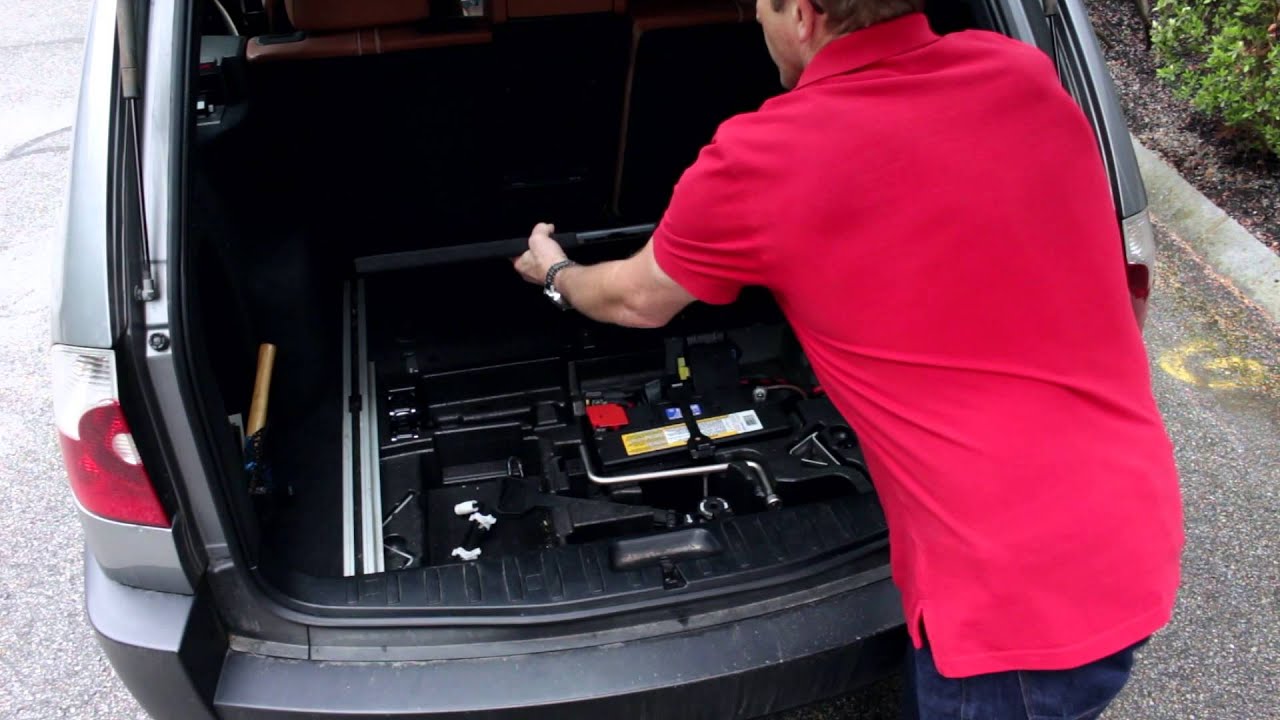 How do you store a replacement spare tire in your car?