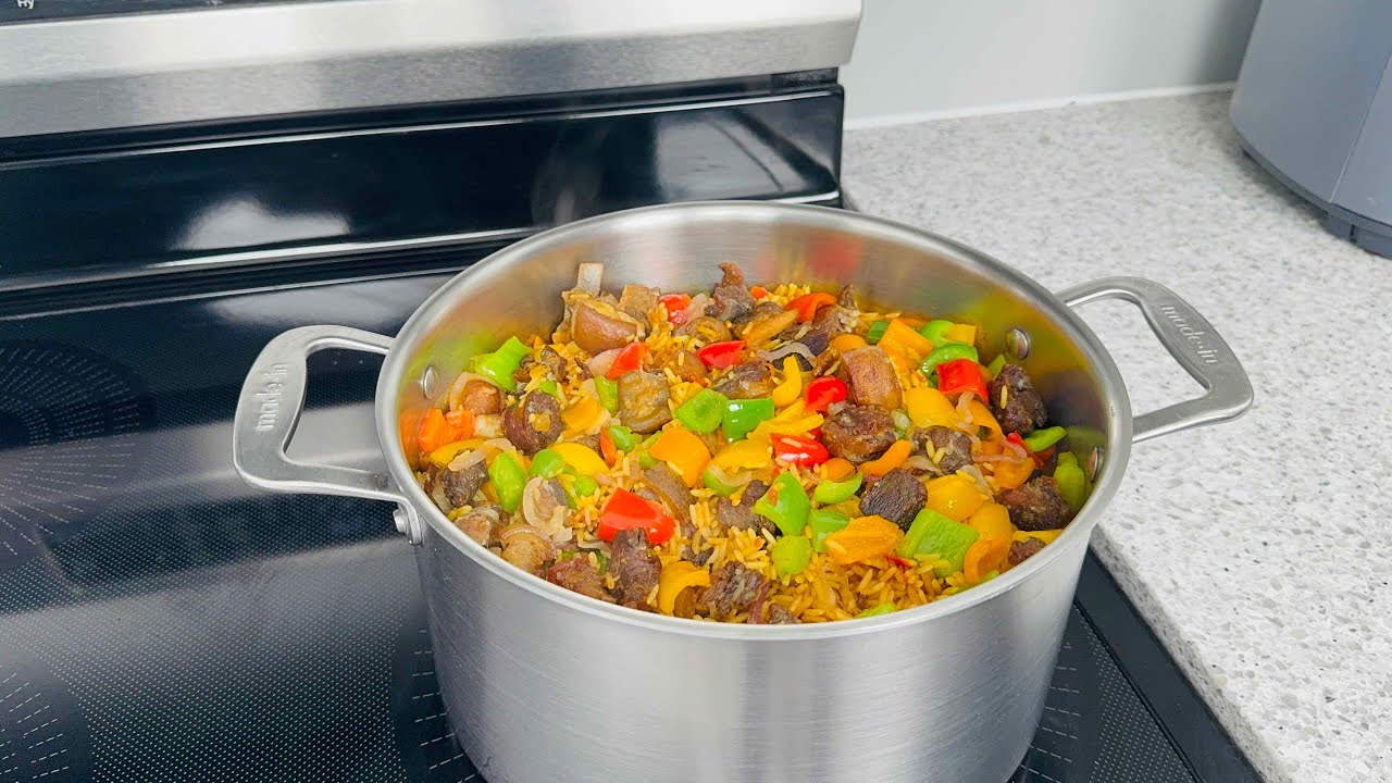 Asun _ ( Goatmeat ) Jollof Rice 