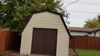 Wood Grain Vinyl Privacy Fence Installed in Spring Lake Park, MN | Northland Fence | Fence Company