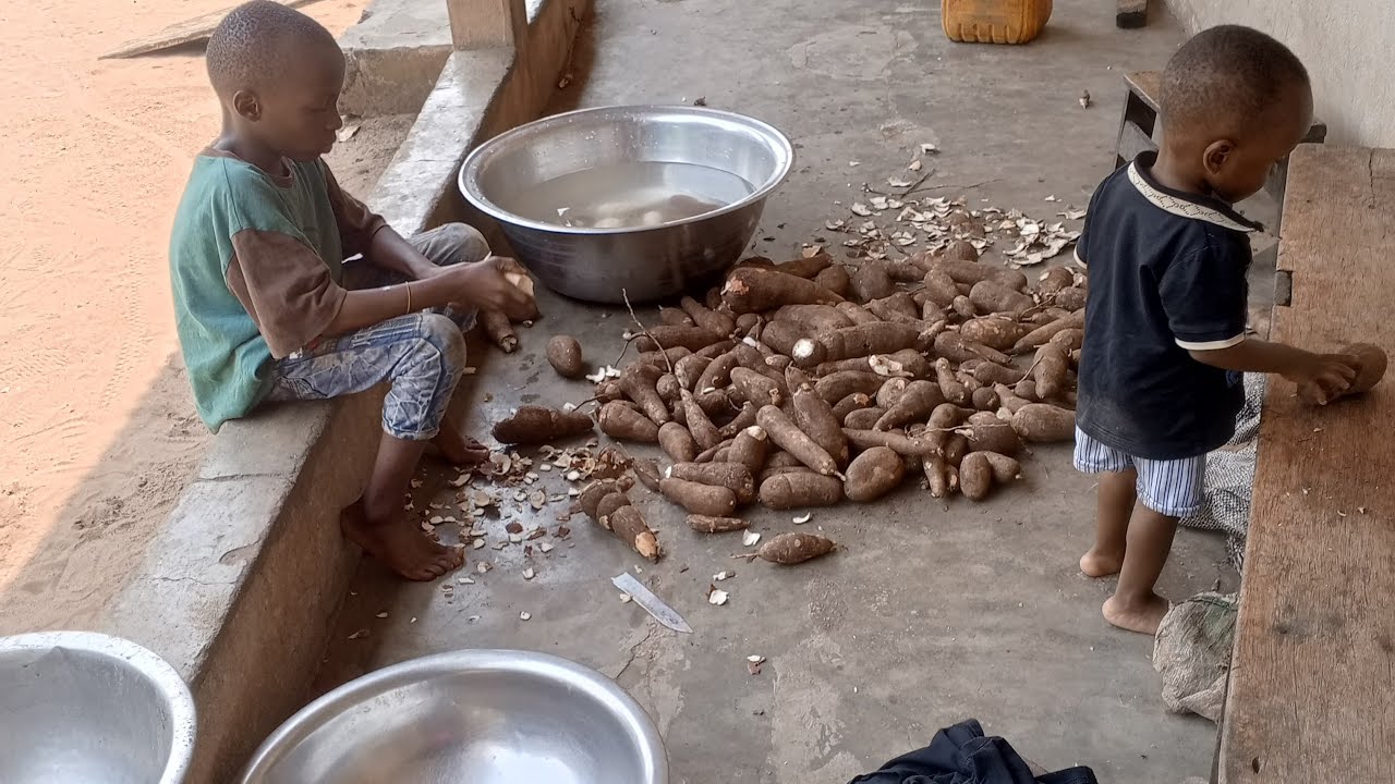 peeling and washing cassava the normal African way