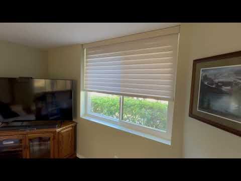 Sheer horizontal shades on a wide Rancho Bernardo family room window