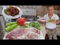 Cocinando en vivo Cerdo Guisado